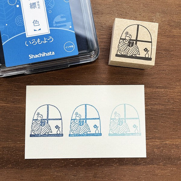 Stamp Marche: Marle Reading Book at Window